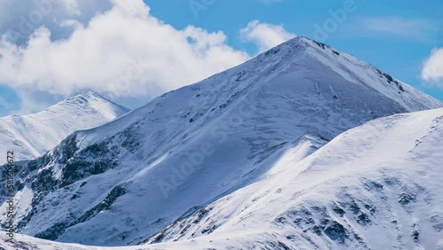 Time lapse of the snowy peak of Wolowiec mountain in Polish western Tatra mountains