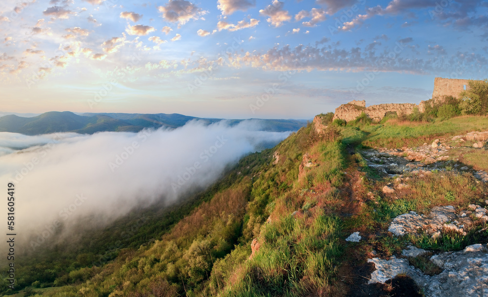 Naklejka premium Morning panorama cloudy view from top of Mangup Kale - historic fortress and ancient cave settlement in Crimea, Ukraine.