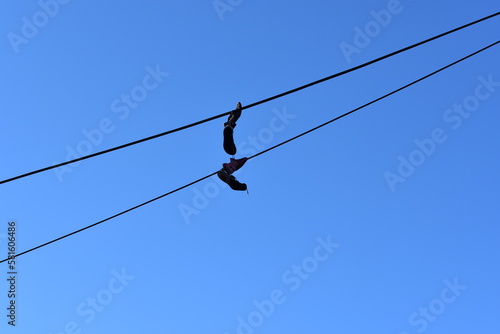 Shoes on a wire