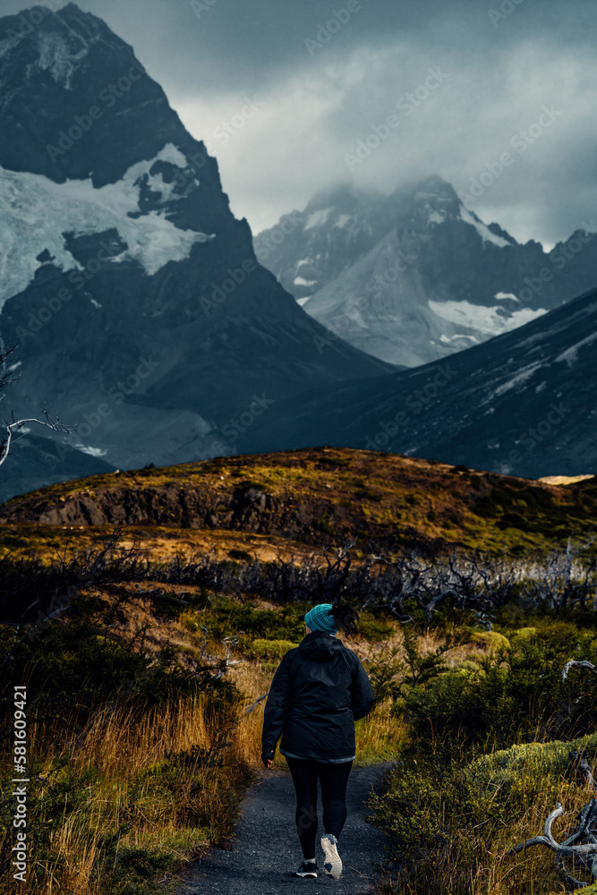 Woman Hiking On Trail Towards Mirador Los Cuernos, Torres Del Paine, Patagonia, Chile
