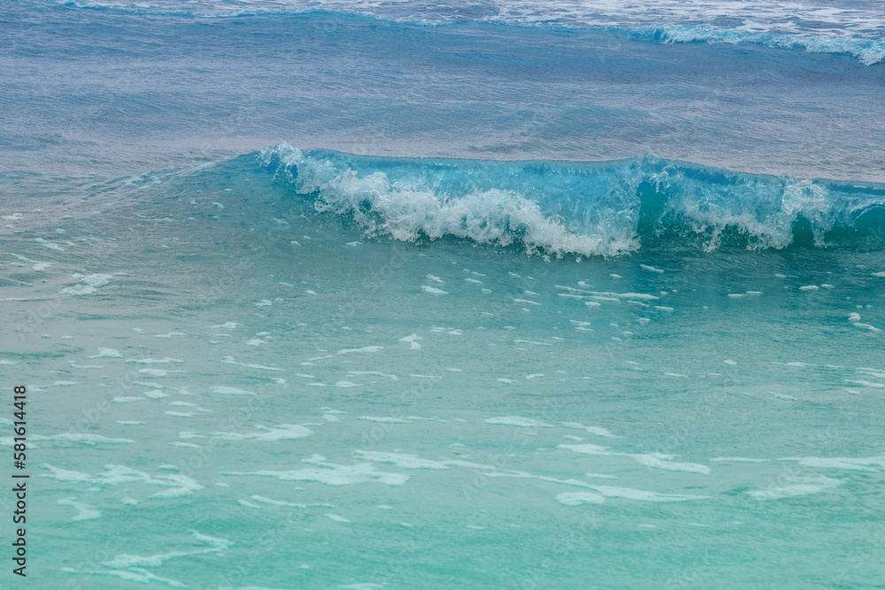 blue sea, fast turquoise waves rush to shore, beautiful tropical seascape, ocean is storming, concept water sports, travel tropics, surf season, danger rip currents, background for designer blue sea, fast turquoise waves rush to shore, beautiful tropical seascape, ocean is storming, concept water sports, travel tropics, surf season, danger rip currents, background for designer