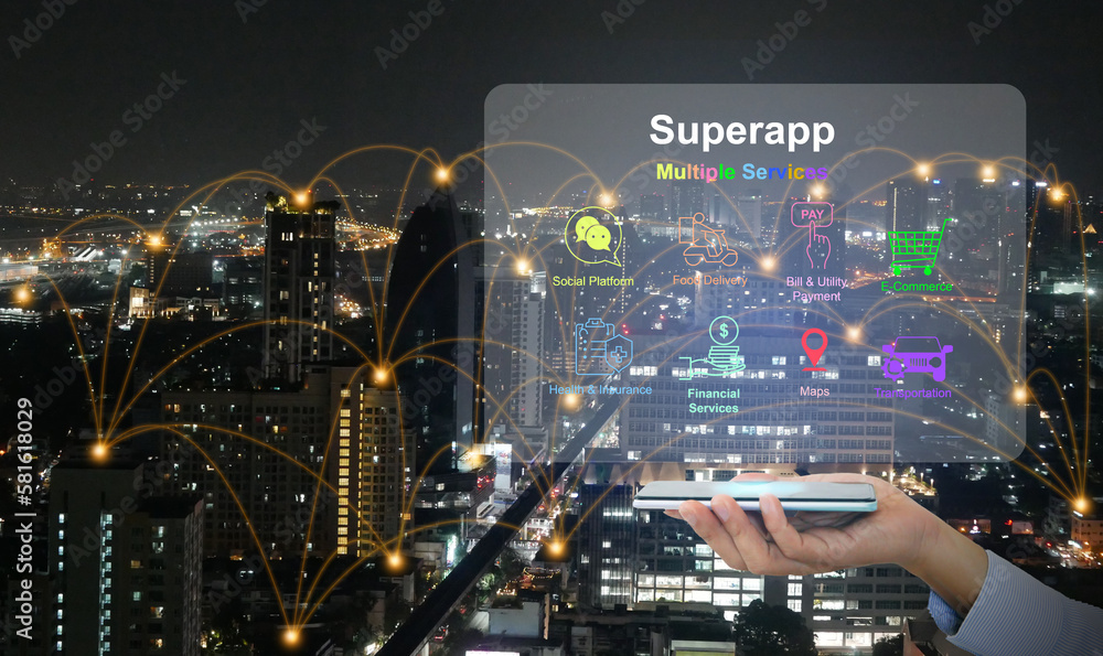 Hand holds a smartphone with virtual screen of superapp that serves multiple services as a one stop service with active network in the background Hand holds a smartphone with virtual screen of superapp that serves multiple services as a one stop service with active network in the background