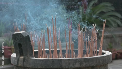 Incense sticks burning in a buddhist temple, Chengdu, Sichuan province, China