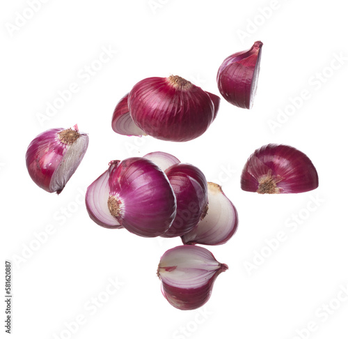 Shallots fall fly in mid air, red fresh vegetable spice shallots onion floating. Organic fresh herbal shallots root head cut chop slice. White background isolated freeze motion high speed shutter