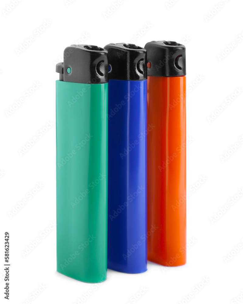 Stylish small pocket lighters on white background Stylish small pocket lighters on white background
