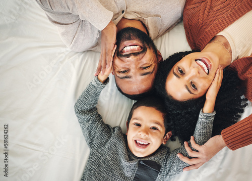 Fotografie Top view, love and family in bedroom, smile and quality time for joy, bonding and happiness