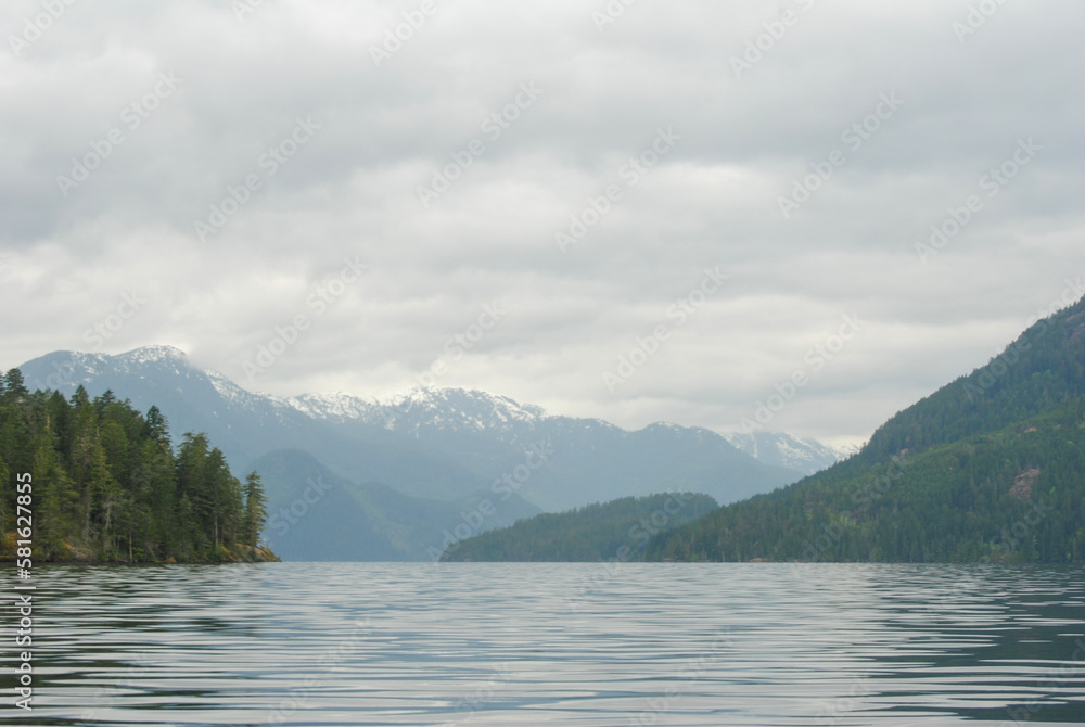 A calm day on Great Central Lake near Port Alberni, Vancouver Island, BC, Canada