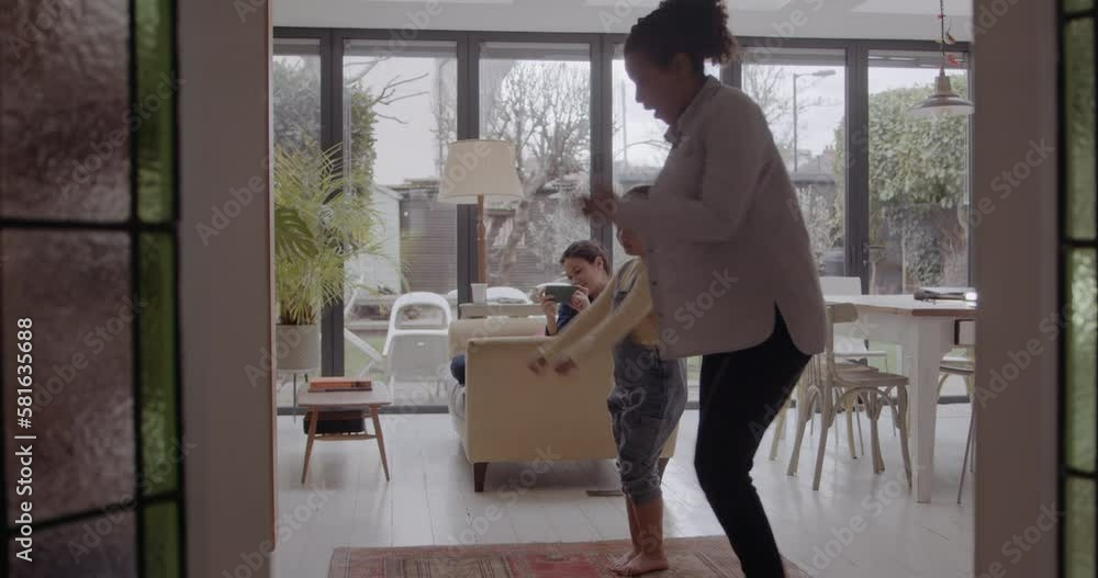 Mother and Child Dancing in Living room Mother and Child Dancing in Living room
