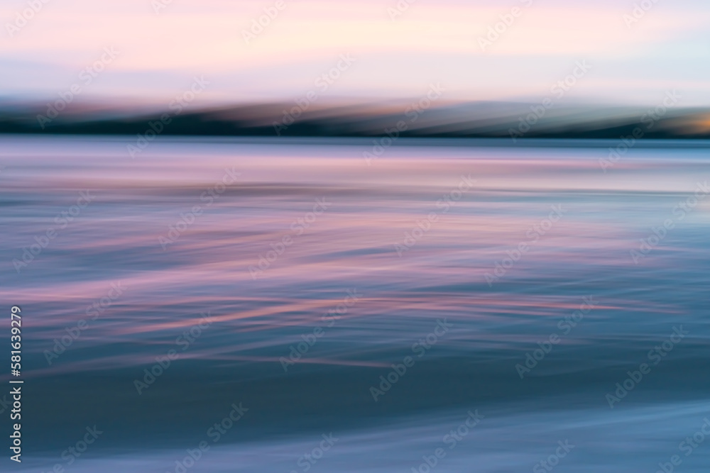 Motion blur effect in coastal sunrise for background or conceptual use Motion blur effect in coastal sunrise for background or conceptual use