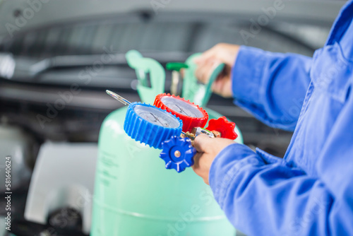 Repairman holding monitor tool to check and fixed car air conditioner  system, Technician check car air conditioning system refrigerant recharge, Air  Conditioning Repair 8988100 Stock Photo at Vecteezy