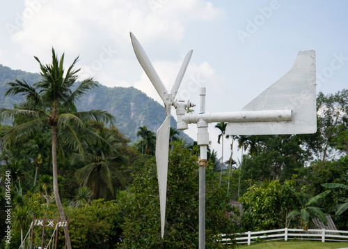 Wind turbines are installed in white farms to tell wind direction.