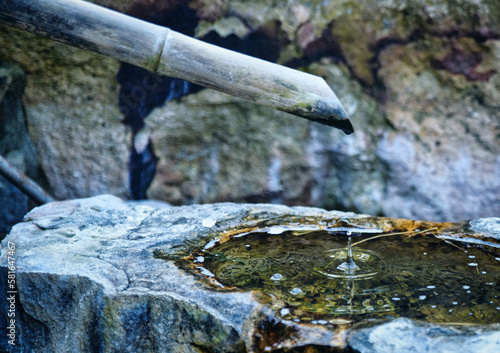 The water was dripping in a tranquil steady pace.