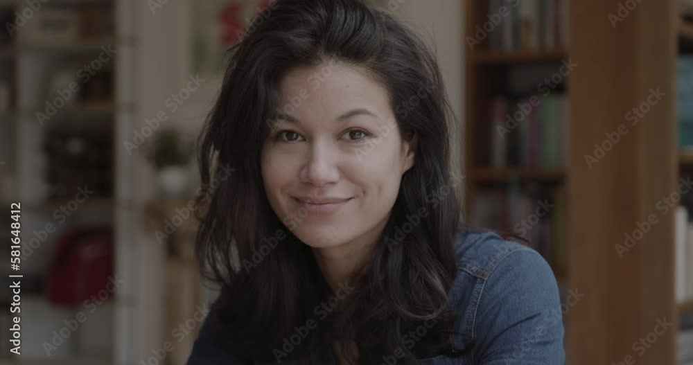 Portrait of Pretty Female Looking at Camera Working at Home Portrait of Pretty Female Looking at Camera Working at Home