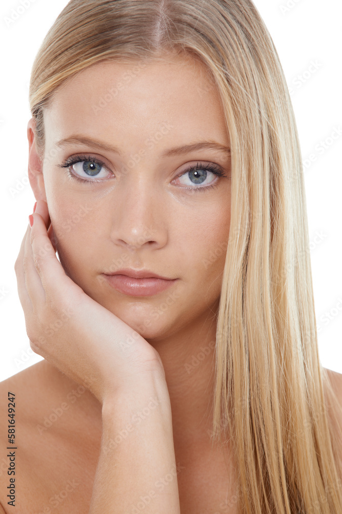 Her skin is flawless. Studio portrait of a beautiful young blond woman with her hand on her cheek isolated on white. Her skin is flawless. Studio portrait of a beautiful young blond woman with her hand on her cheek isolated on white.