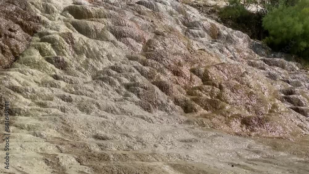Mineral cascade waterfall in middle east Asia water reflection the sun in summer time season in Damash Gilan ancient flow calcium carbonated liquid famous natural nature heritage landmark attraction Mineral cascade waterfall in middle east Asia water reflection the sun in summer time season in Damash Gilan ancient flow calcium carbonated liquid famous natural nature heritage landmark attraction