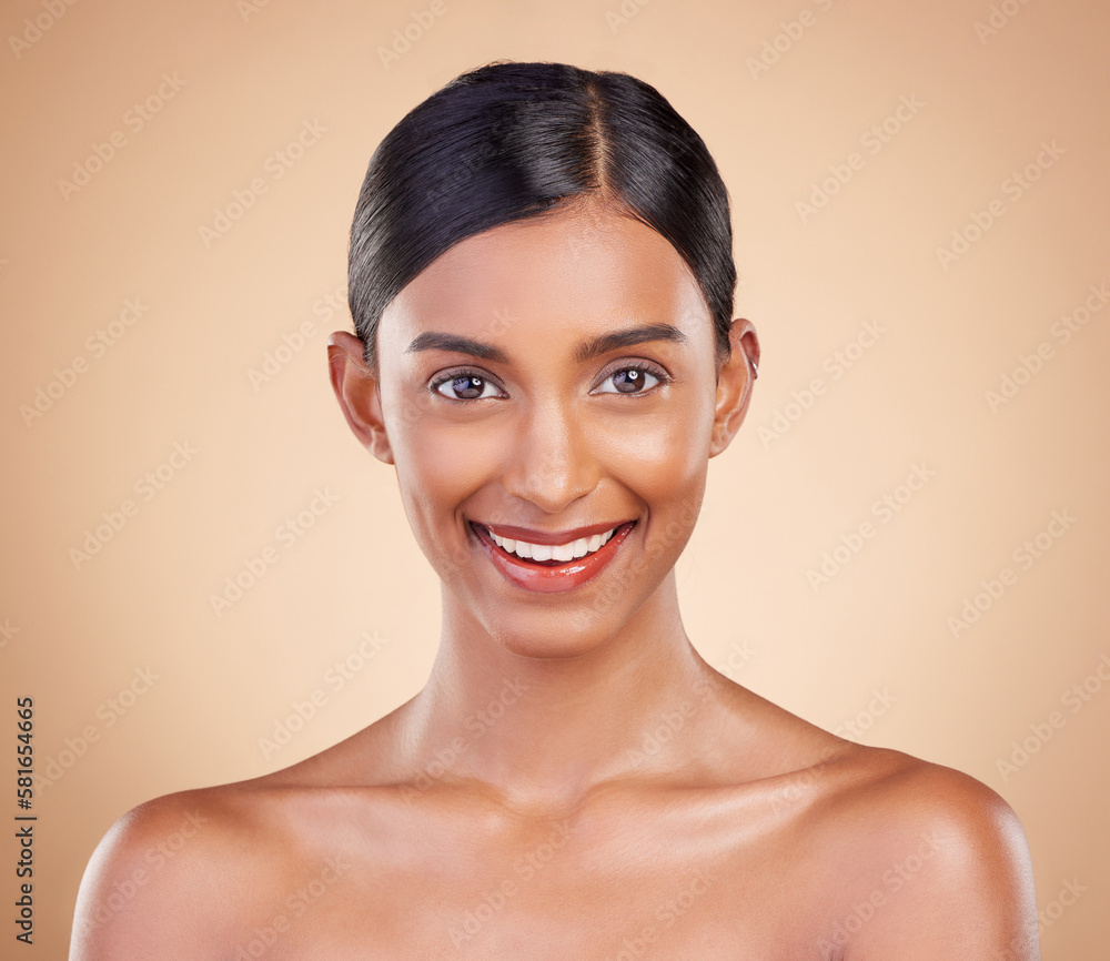 Portrait, beauty and smile with a model woman in studio on a beige background for natural skincare. Face, happy and aesthetic with an attractive young female posing for cosmetics or luxury wellness
