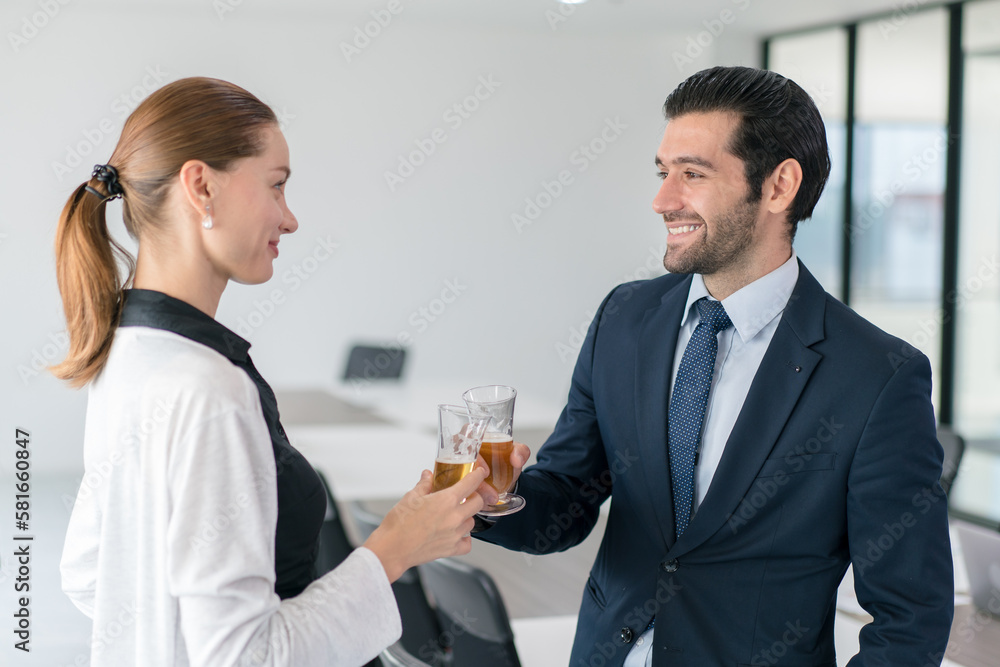 Corporate co-workers having drinks after meeting, People clinking glasses with sparkling wine indoors, Business people celebrating inside modern office. Corporate co-workers having drinks after meeting, People clinking glasses with sparkling wine indoors, Business people celebrating inside modern office.