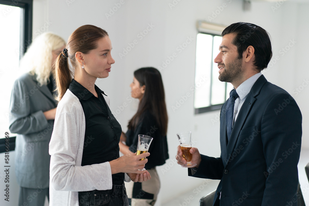 Corporate co-workers having drinks after meeting, People clinking glasses with sparkling wine indoors, Business people celebrating inside modern office. Corporate co-workers having drinks after meeting, People clinking glasses with sparkling wine indoors, Business people celebrating inside modern office.