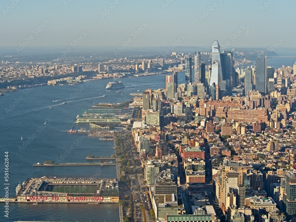 Looking out on Manhattan towards Hudson Yards from atop the One World Observatory at One World Trade Center, the tallest building in the Western Hemisphere rising to a symbolic 1,776 feet