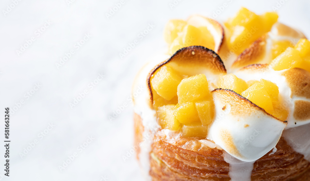 Peach croissant donuts on marble background Peach croissant donuts on marble background