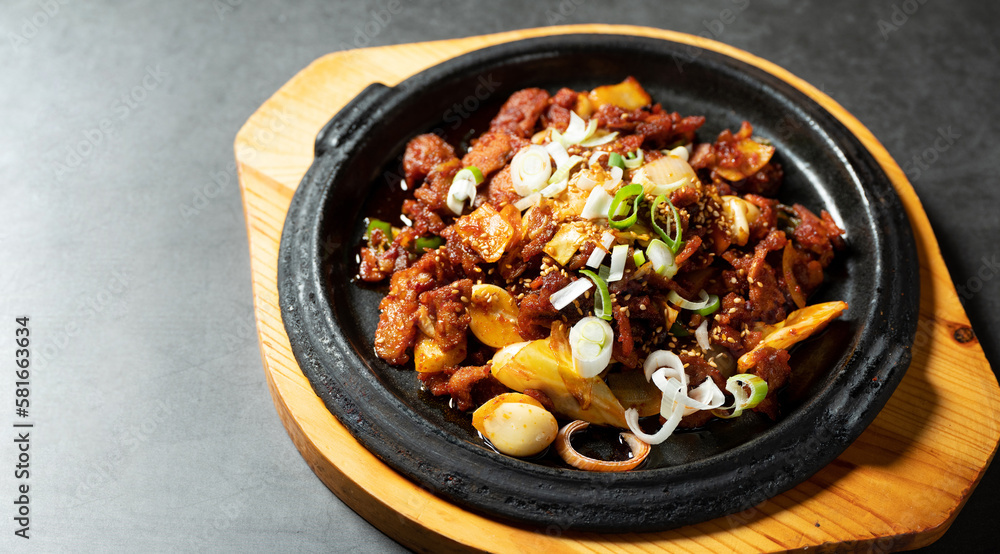 Spicy stir-fried meat on iron plate Spicy stir-fried meat on iron plate
