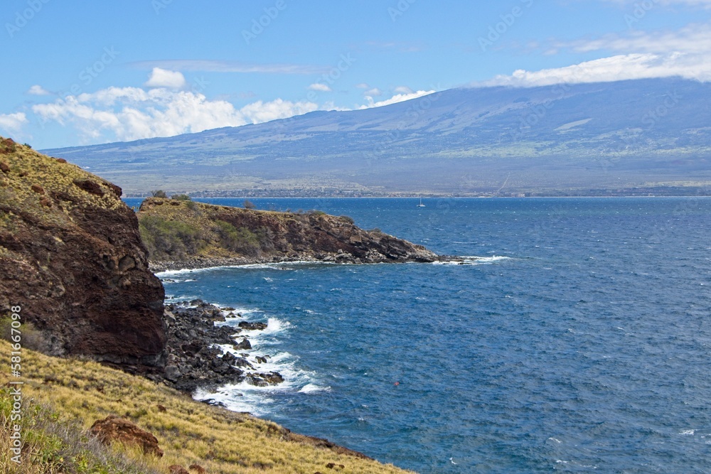 Waves crash on the rocky shores of the southern part of the western half of the Hawaiian island of Maui Waves crash on the rocky shores of the southern part of the western half of the Hawaiian island of Maui