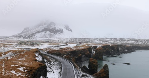 Winter view across Arnarstapi fishing village on the southern side of the Snæfellsnes peninsula, Iceland photo