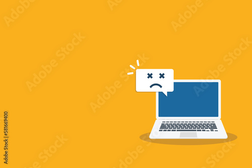 Broken laptop with sad smile. Broken laptop service, recovery and repair concept.	