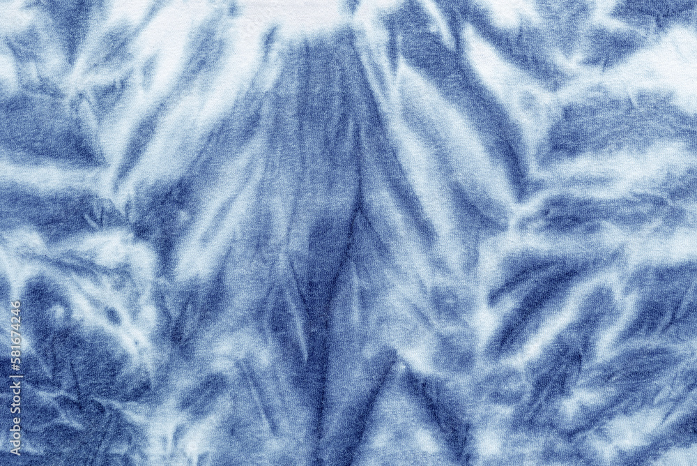 tie dye pattern hand dyed on cotton fabric abstract texture background. tie dye pattern hand dyed on cotton fabric abstract texture background.