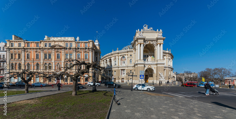 Façade of the Odessa Opera House in the Vienna Baroque style on a sunny spring day
