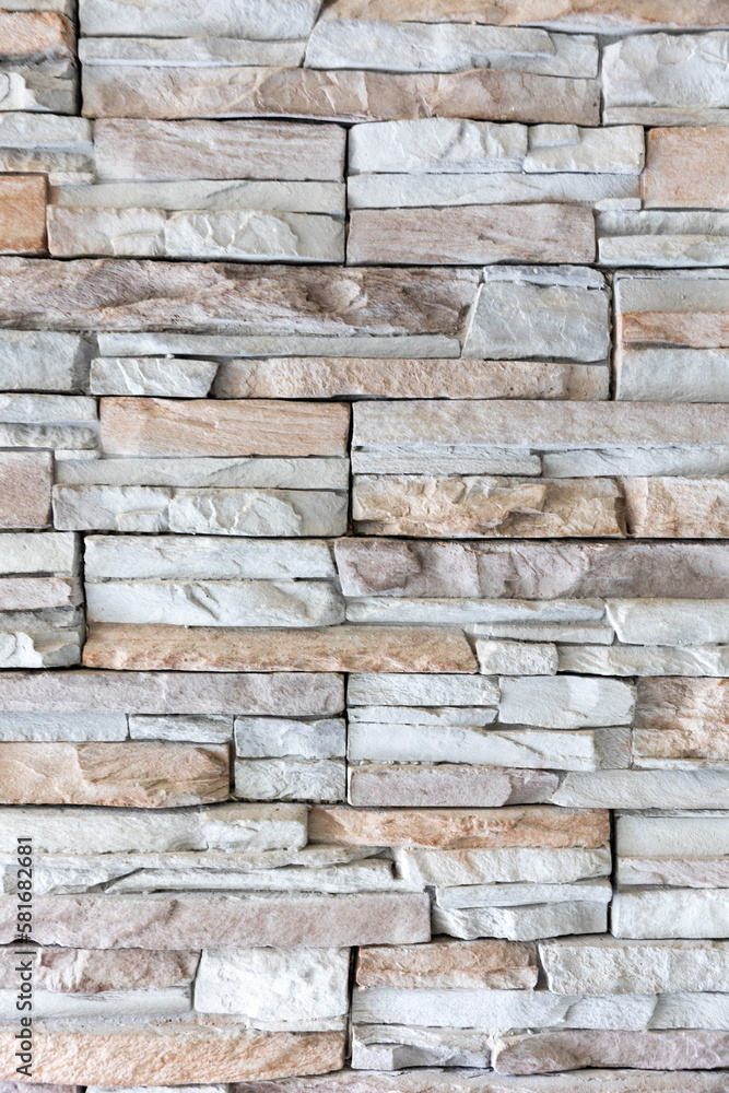 Modern and stylish various colored brick pattern textures are regularly listed and stacked with a pile of stone material background Modern and stylish various colored brick pattern textures are regularly listed and stacked with a pile of stone material background