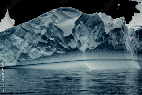 Massive Iceberg In Antarctica Looks Textured with Moody Colors © David