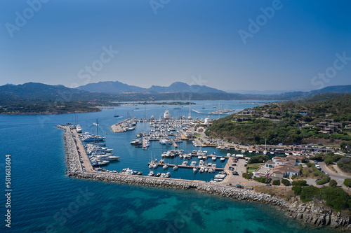 Large boat dock in Marina in Sardinia aerial view. Boat parking top view.