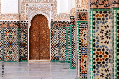 Beautiful typical moroccan tiles in the Madrasa - Marocco photo