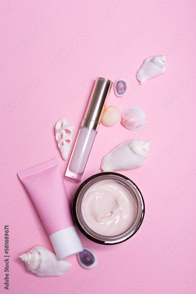 Beauty background with facial cosmetic products with empty copy space. Makeup, skin care concept with pastel colored background. Beauty background with facial cosmetic products with empty copy space. Makeup, skin care concept with pastel colored background.