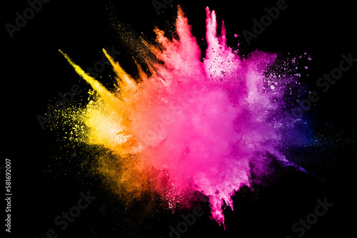Colorful background of pastel powder explosion.Multi colored dust splash on black background.Painted Holi.