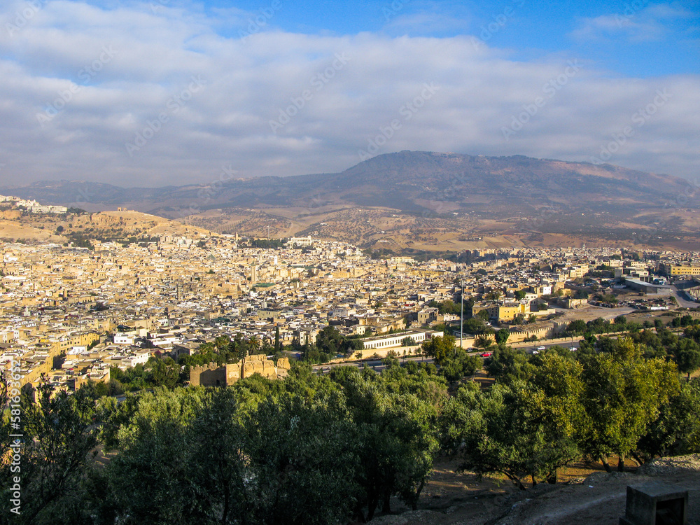 view to skyline of Fes in Morocco in sunset light