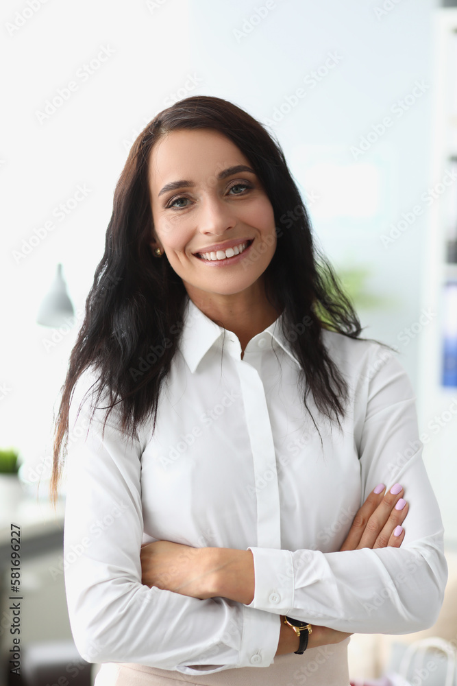 Portrait of smiling beautiful woman in white shirt. Portrait of smiling beautiful woman in white shirt.