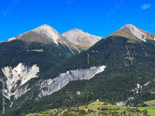 High alpine peaks Piz Linard (2767 m), Lenzerhorn (2906 m) and Piz Mulain (2627 m) above  the river Albula or Alvra - Canton of Grisons, Switzerland (Kanton Graubünden, Schweiz) © Mario