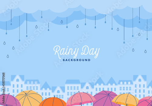 雨の降る街並みと傘の風景