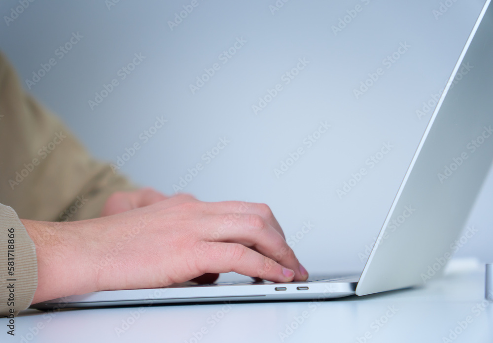 IT specialist typing on laptop keyboard. Close up view of hands. CEO manager working at his own workplace from home. Confident manager. IT specialist typing on laptop keyboard. Close up view of hands. CEO manager working at his own workplace from home. Confident manager.