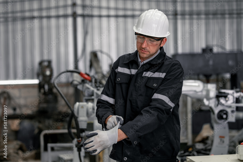 To ensure efficient operation, male technician is required to wear gloves. For both preventative and corrective maintenance on robotic systems, compliance with the health and safety program is needed. To ensure efficient operation, male technician is required to wear gloves. For both preventative and corrective maintenance on robotic systems, compliance with the health and safety program is needed.