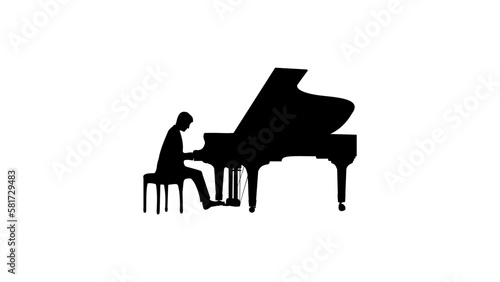 Fotografiet man pianist plays the grand piano
