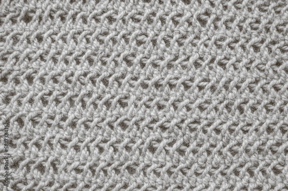 Handmade knitted background with detail woven threads. Handmade knitted background with detail woven threads.