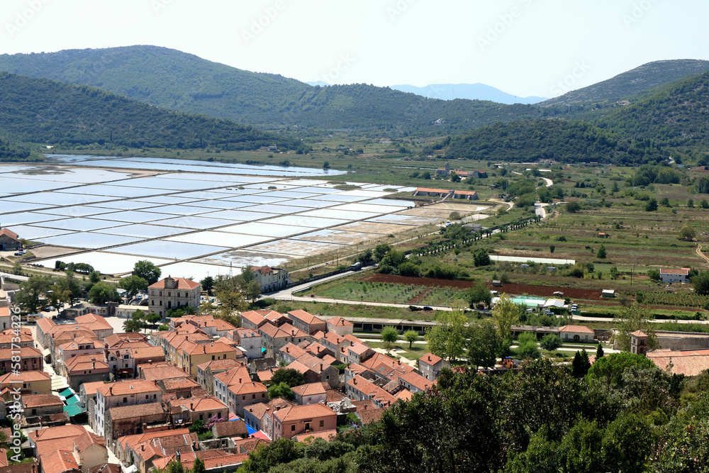 view over the rooftops and salt pans in Ston, Croatia