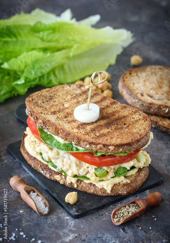 Chickpea salad sandwich prepared and served