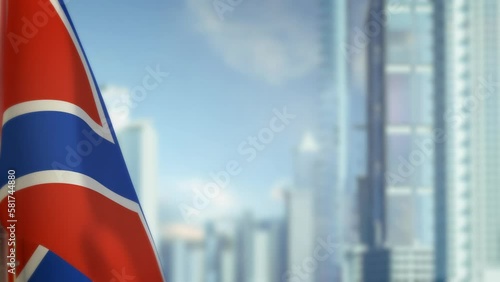 hanging Novorossia flag on city bg with blue sky photo