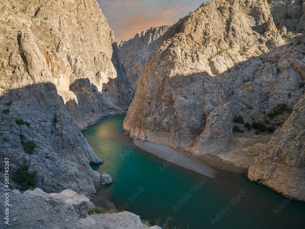 View of the deep canyon and the Euphrates river at sunrise. Dark Canyon ( Turkish; Karanlık  Kanyon ) in Kemaliye. Turkey travel destinations. Kemaliye, Erzurum, Turkey