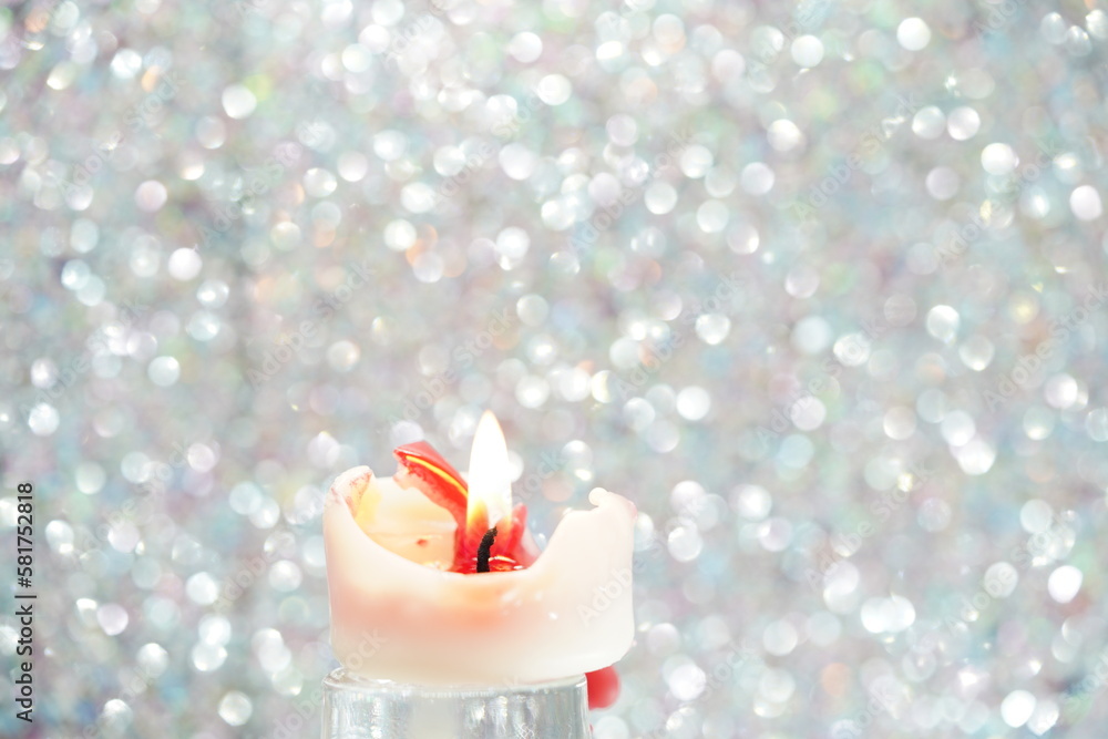 white candle with red wax and flame white candle with red wax and flame