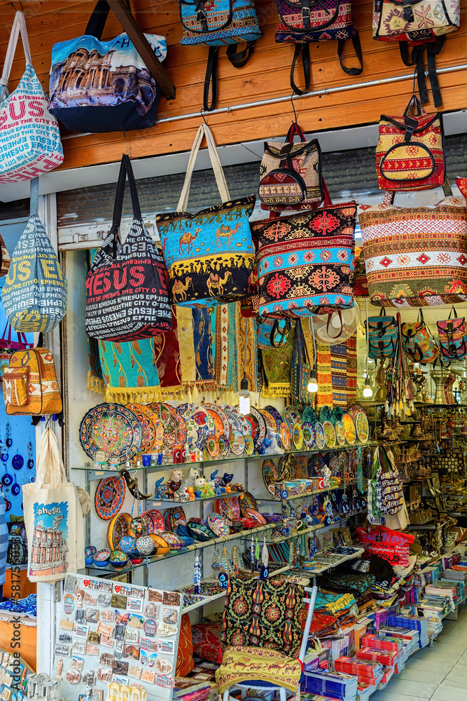 Traditional Turkish colorful handbags on store at the Selcuk Bazaar (near ancient Ephesus). Selected focus, vertical shot. Selcuk (Izmir region). Turkey (Turkiye)